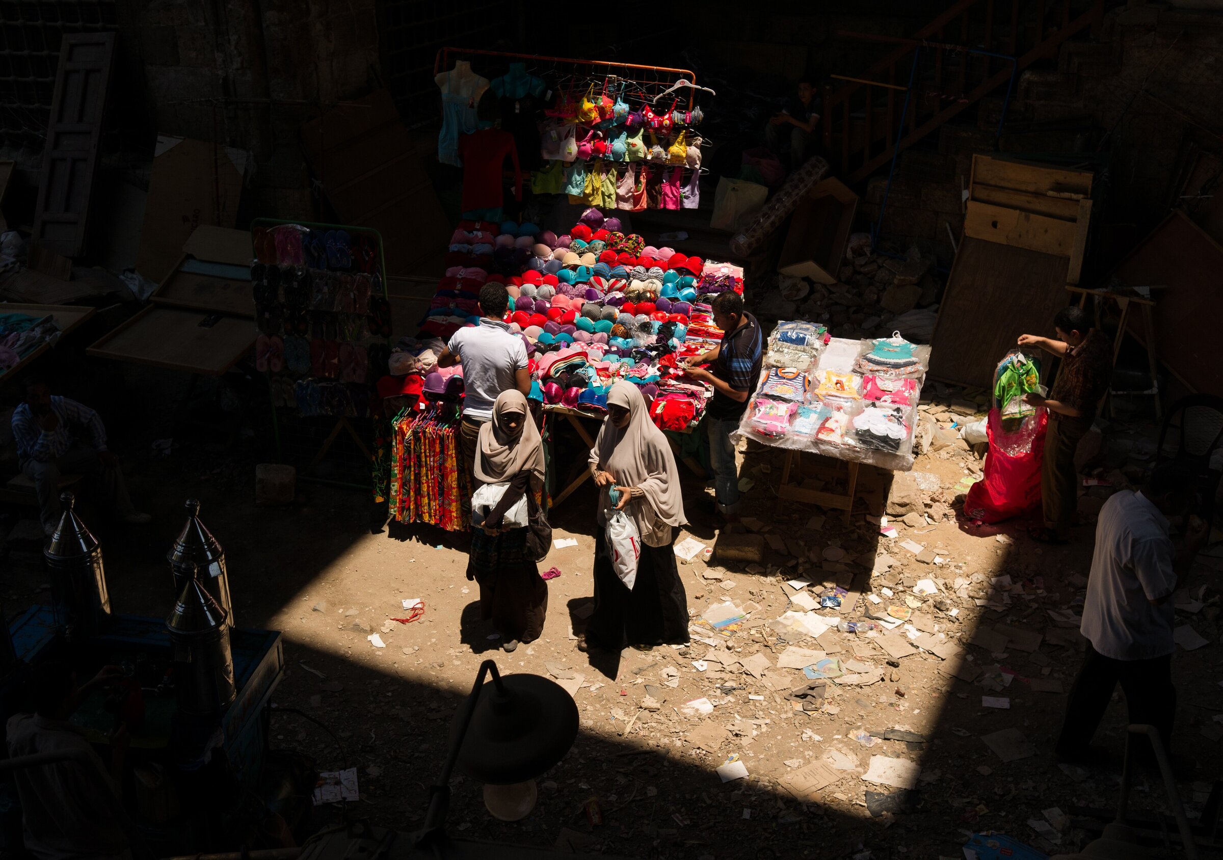 A brightly lit textile shop in the bazaars of old Cairo