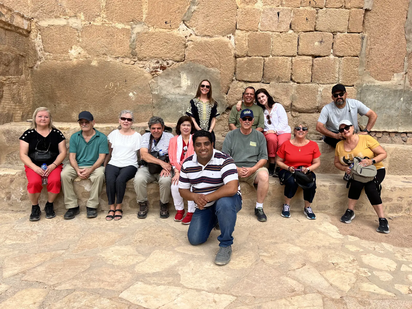 Atenara guests resting in a temple courtyard in Luxor