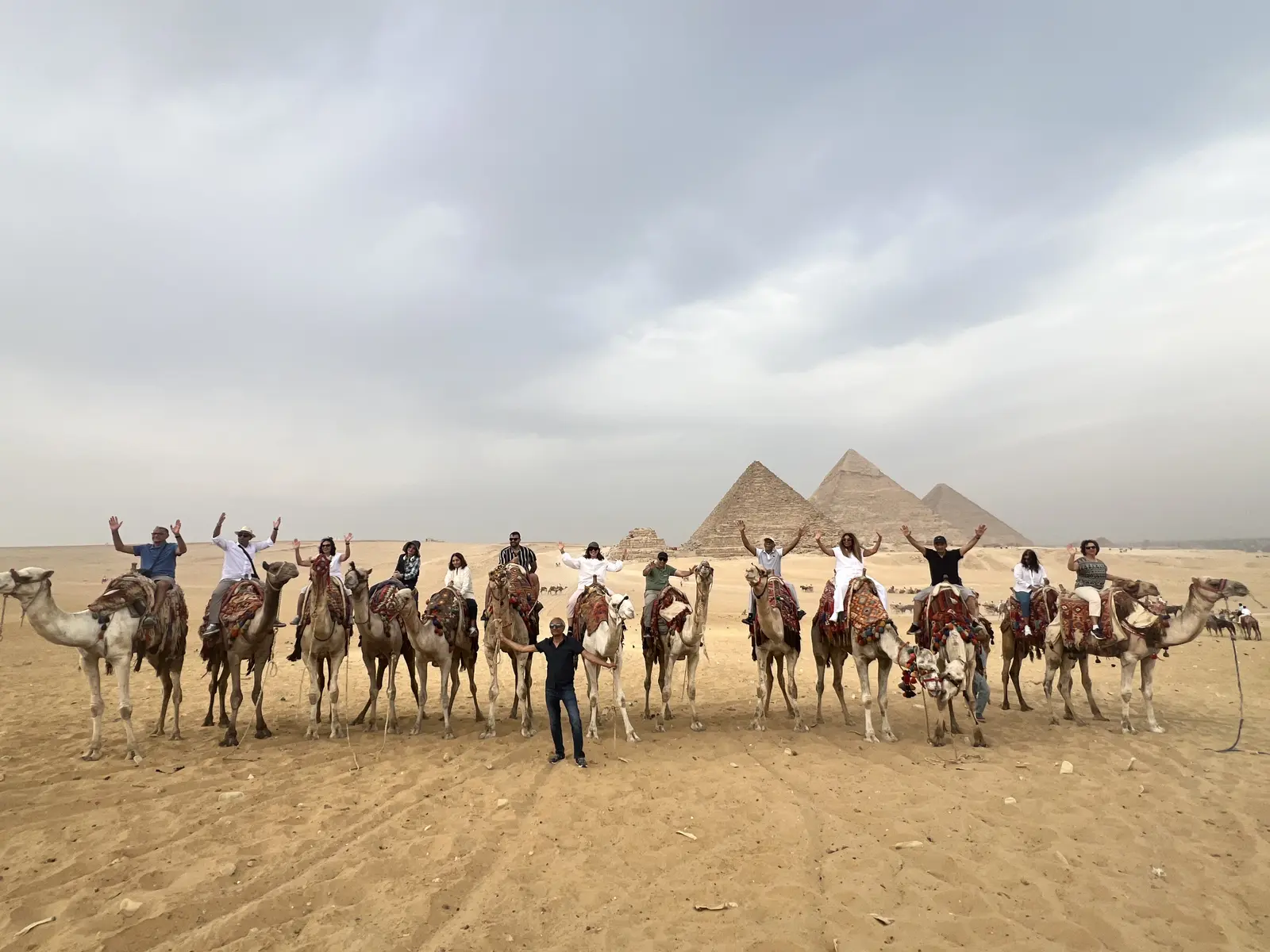 Atenara guests crossing the Giza Plateau on camels